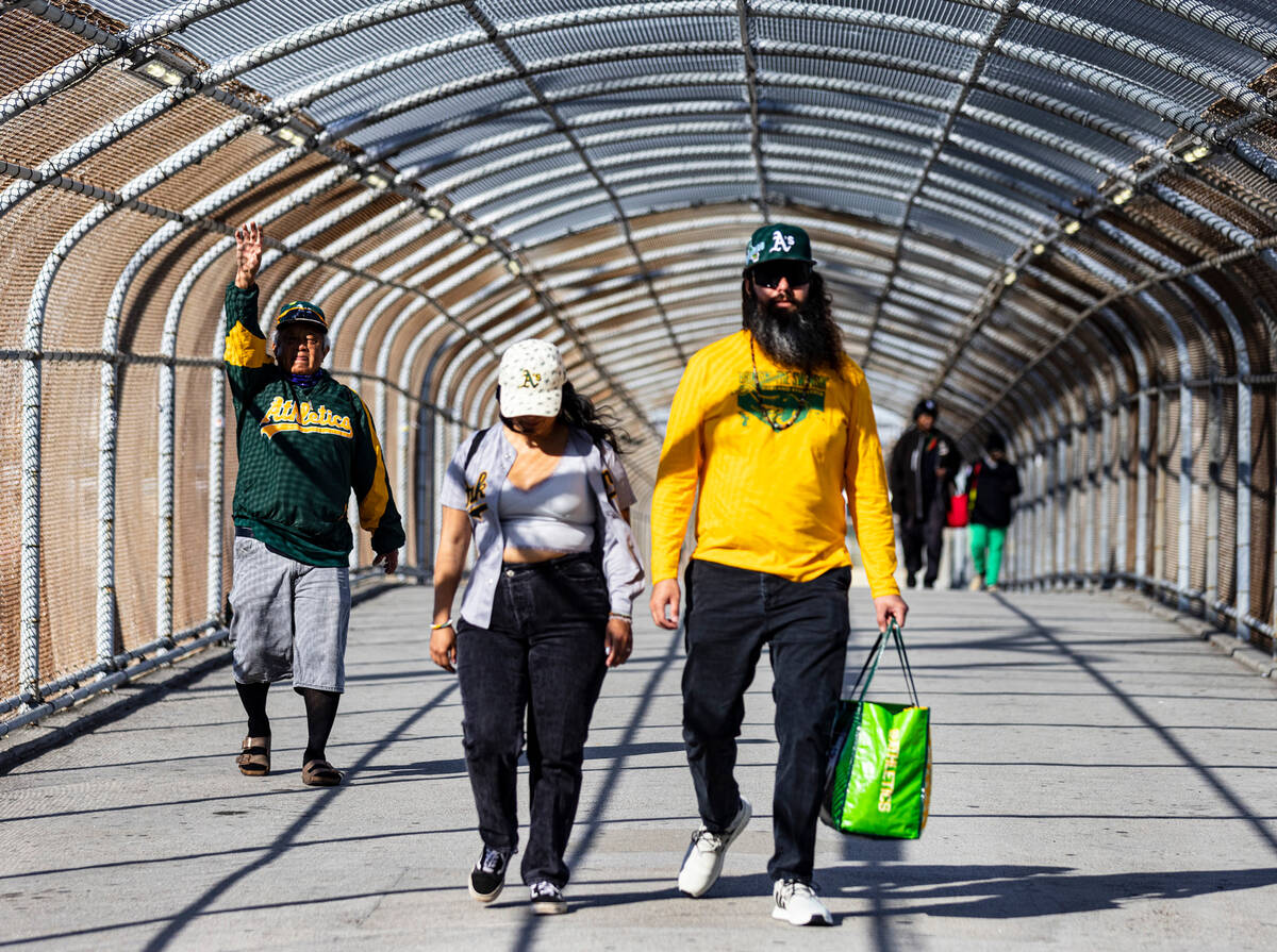 The Oakland A's fans arrive to watch a baseball game between the A’s and the Cincinnati Reds ...