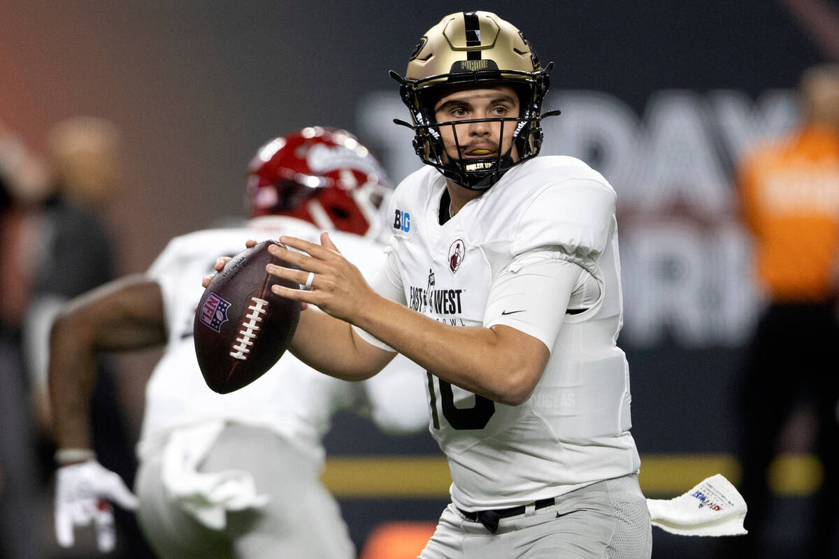 East quarterback Aidan O'Connell of Purdue prepares to throw during the first half of the East ...