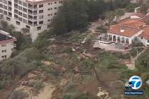 In this image from KABC7 video, is an aerial view of a landslide on the western side of the Cas ...
