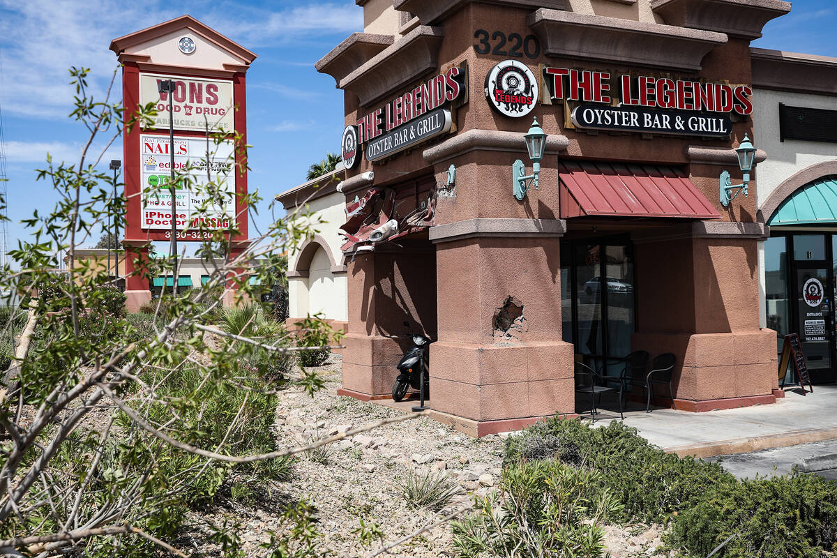 The scene of a fatal car crash outside The Legends Oyster Bar & Grill in Las Vegas, Sunday, ...
