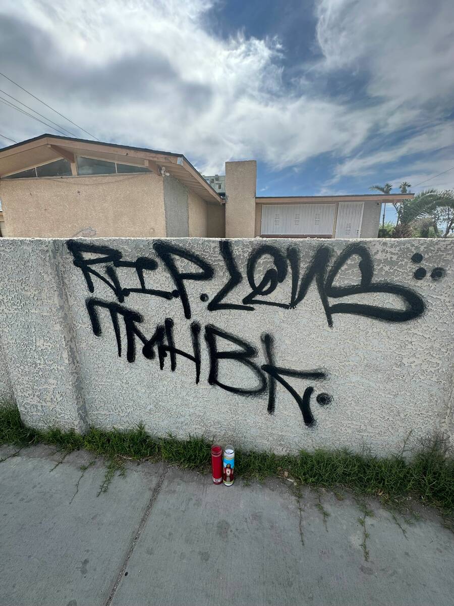 Spray painted graffiti near the scene of where a man was killed at Upland Boulevard and Evergre ...