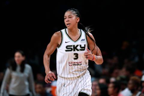 FILE - Chicago Sky forward Candace Parker runs up the court during the team's WNBA basketball g ...