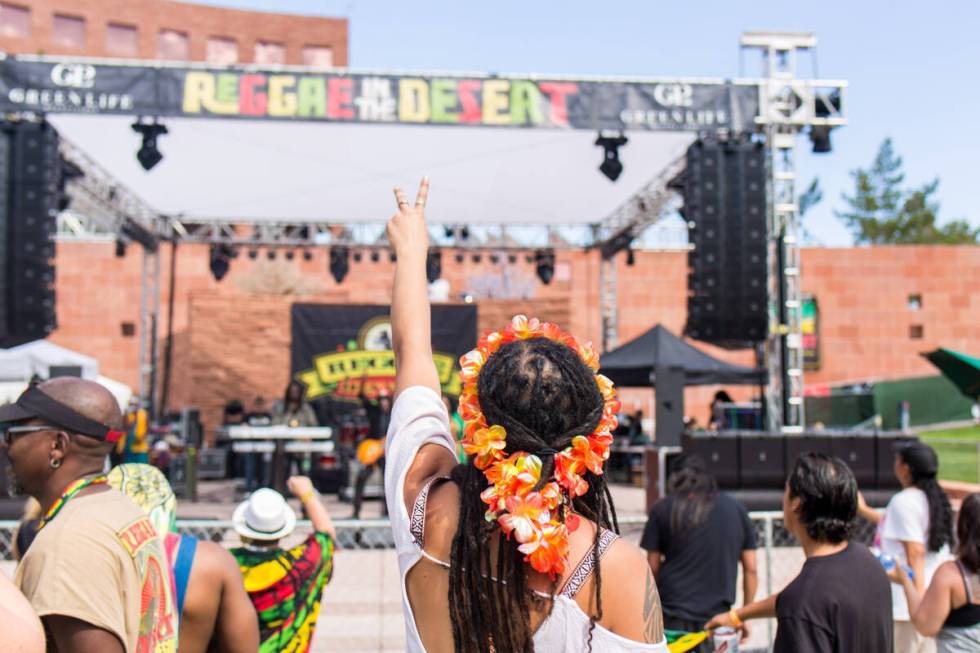 A crowd dances and sings during the Reggae in the Desert festival on Saturday June 11, 2016. (L ...