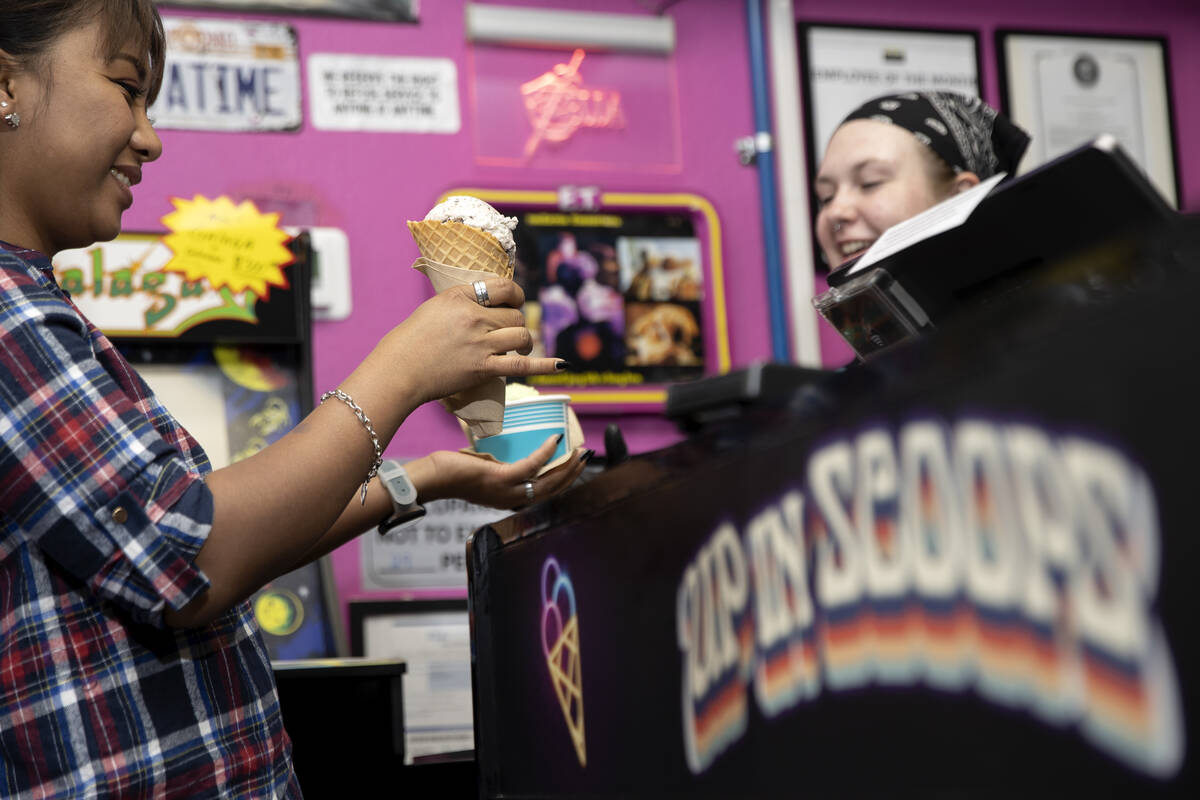Gretchen Polendey gets her ice cream at Up in Scoops on Saturday, April 15, 2023, in Las Vegas. ...