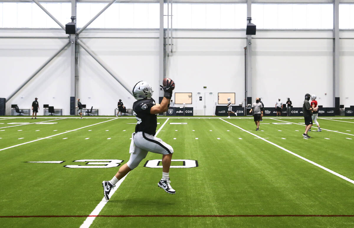 Las Vegas Raiders fullback Alec Ingold catches the ball during an NFL training camp practice in ...