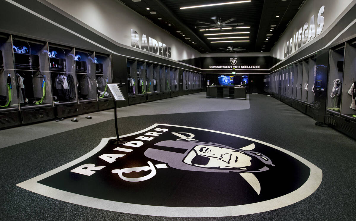 A large logo is painted on the floor in the expansive locker room within the Intermountain Heal ...