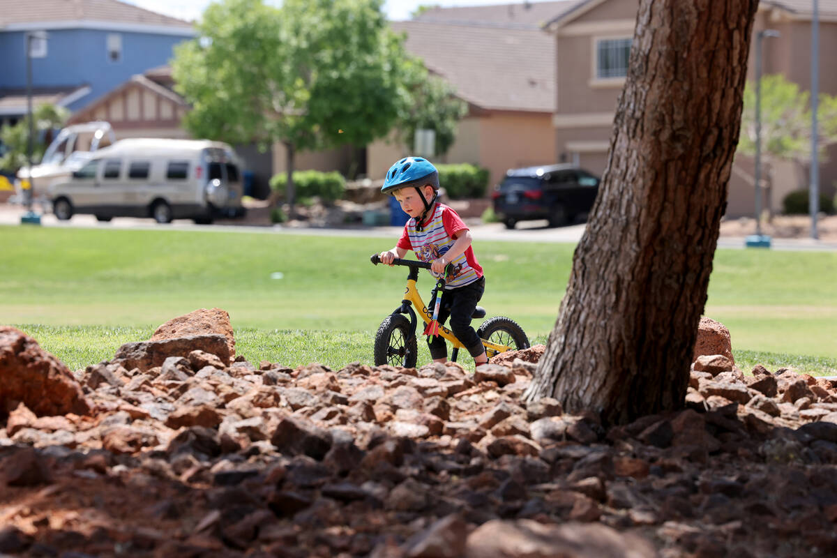 Asher, 3, rides his bike in Acacia Park in Henderson Friday, May 5, 2023. (K.M. Cannon/Las Vega ...