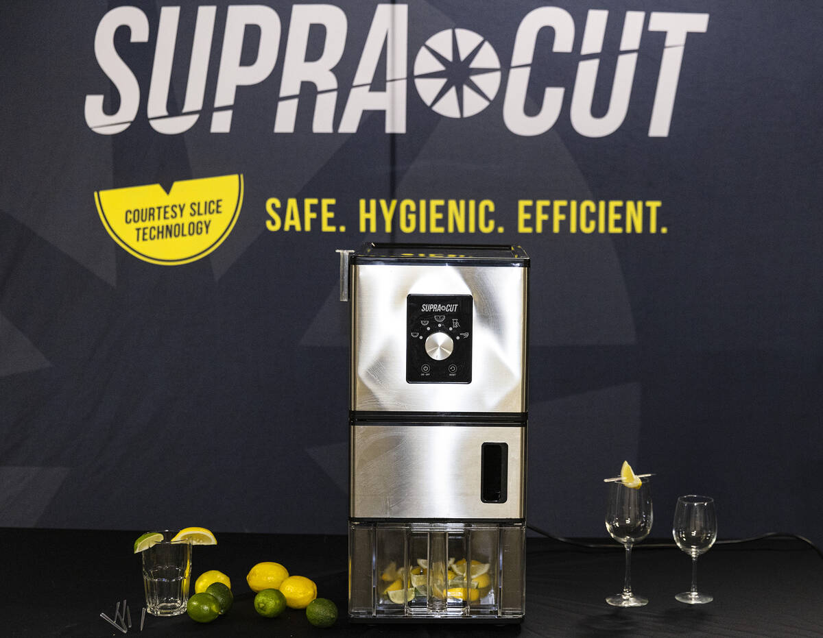 A SupraCut, an automated citrus slicer, is displayed at SupeaCut Systems International headquar ...