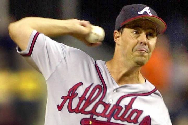 Atlanta Braves starting pitcher Greg Maddux delivers a pitch against the Pittsburgh Pirates Wed ...