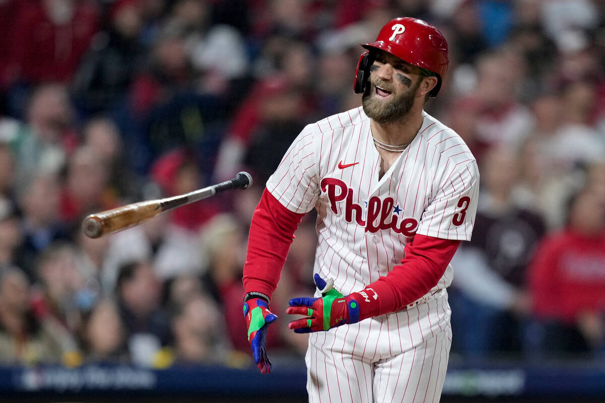 Philadelphia Phillies designated hitter Bryce Harper flies out during the =8 inning in Game 3 o ...