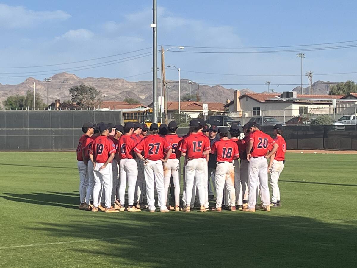 Coronado huddles around coach Garrett Smith following its 4-3 road win over Basic on Monday. (A ...