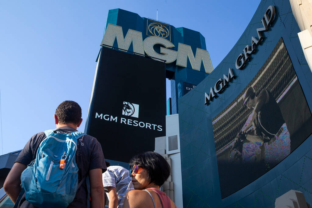 Visitors to the Las Vegas Strip pass the MGM Grand on Wednesday, Aug. 4, 2021. (Ellen Schmidt/L ...