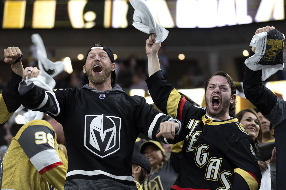 Golden Knights fans celebrate after their team scored during the first period in Game 1 of an N ...