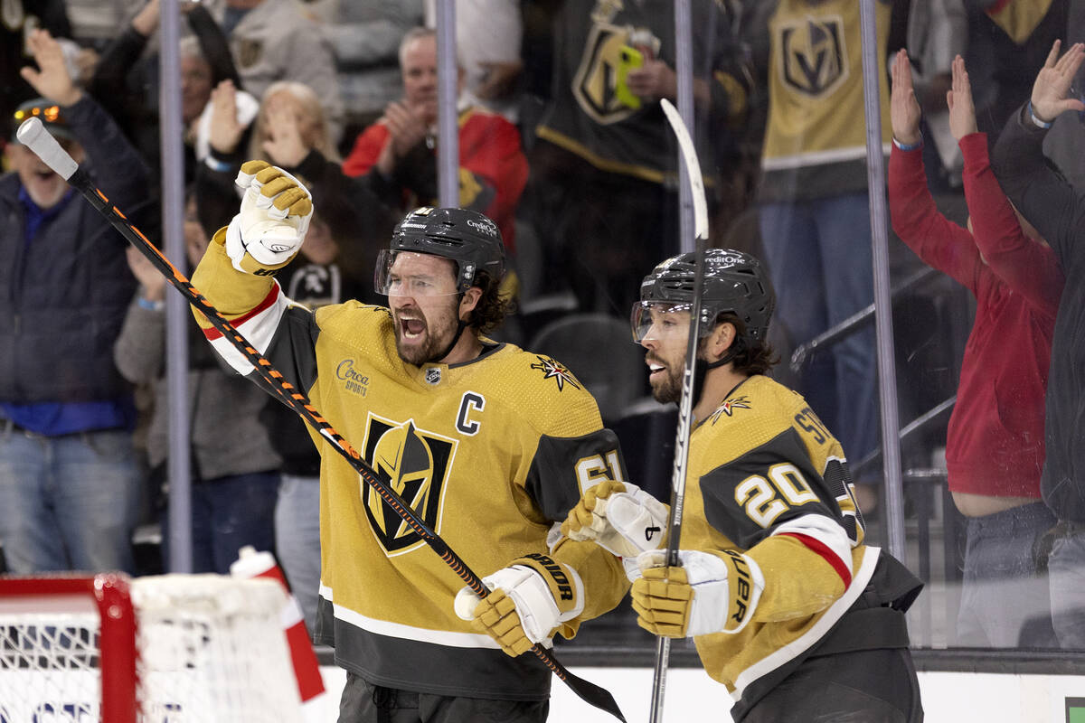 Golden Knights right wing Mark Stone (61) and center Chandler Stephenson (20) celebrate after s ...