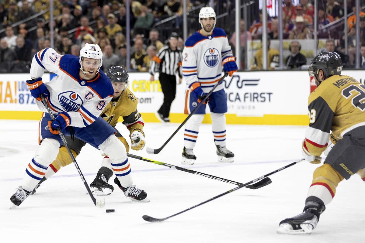 Edmonton Oilers center Connor McDavid (97) skates with the puck against Golden Knights center W ...