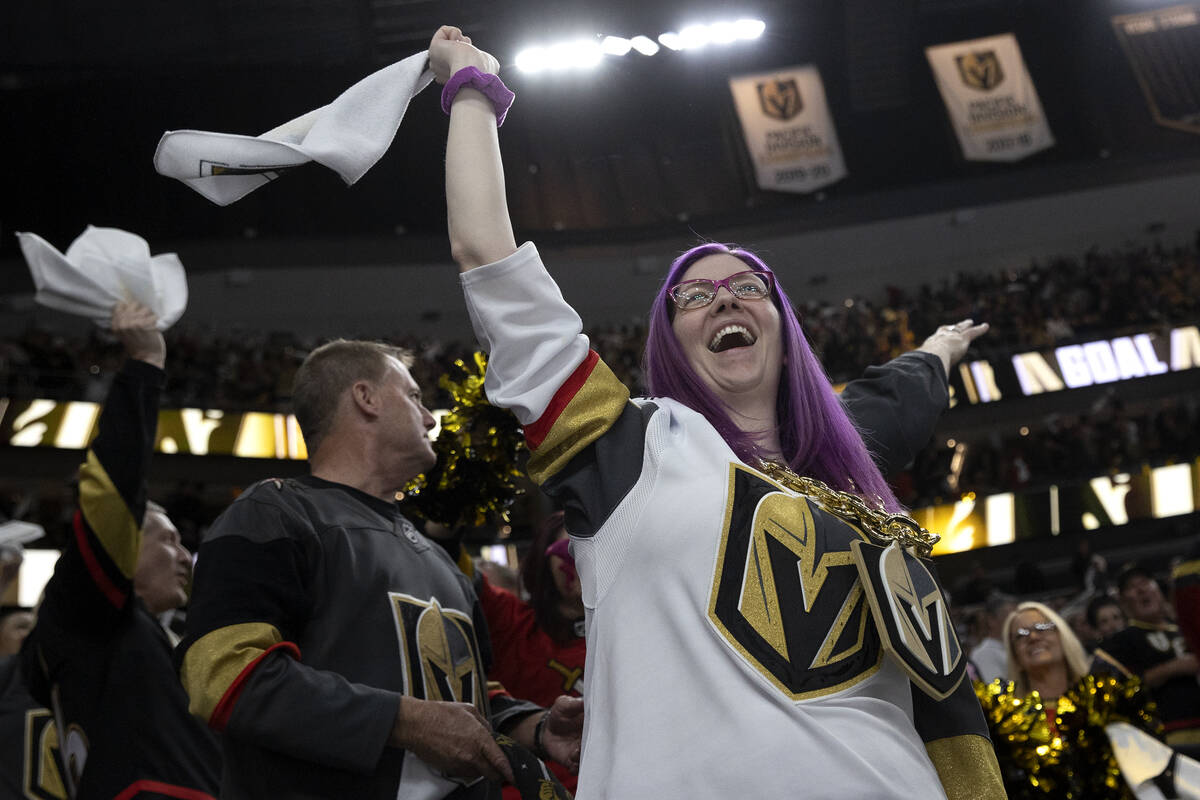 Golden Knights fans celebrate after their team scored during the third period in Game 1 of an N ...