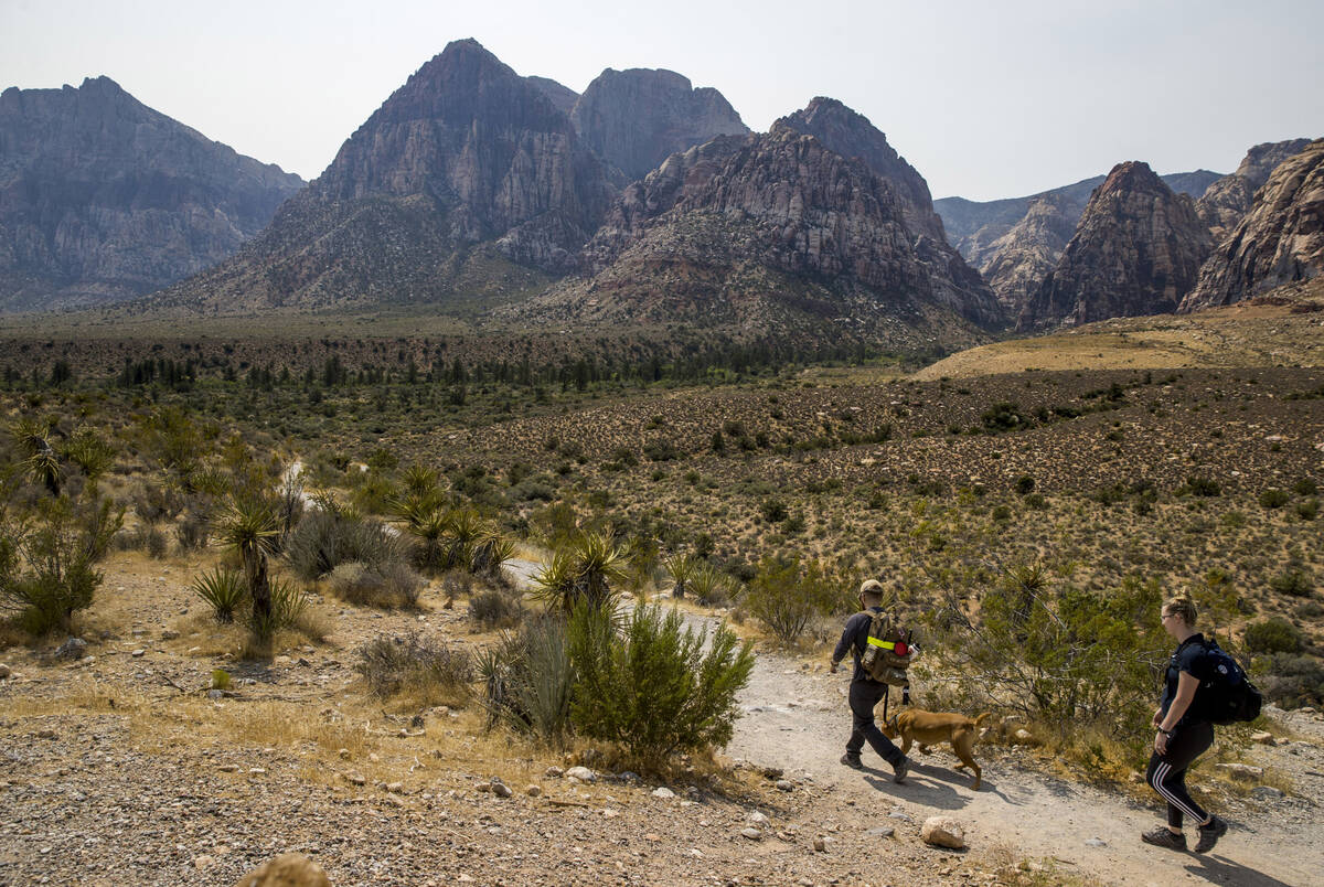 Hikers make their way along the Pine Creek Canyon trail in the Red Rock Canyon National Recreat ...