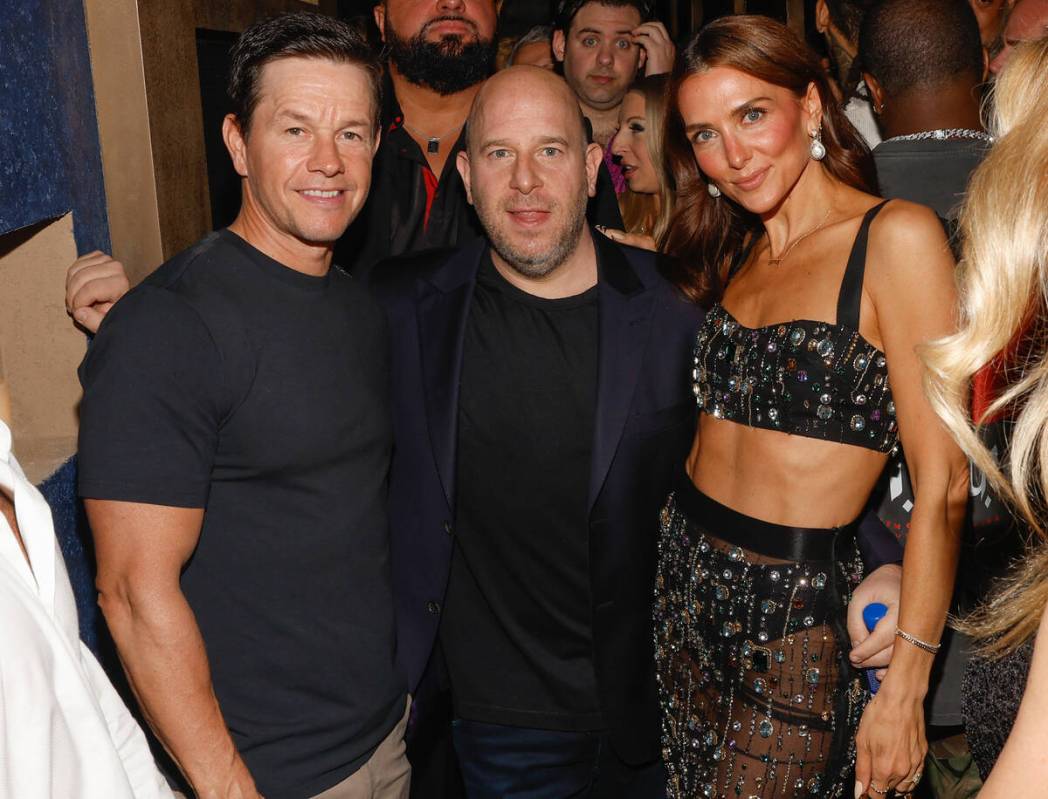 Actor Mark Wahlberg, Noah Teppenberg and Melissa Wood-Teppenberg attend the grand opening of Ca ...