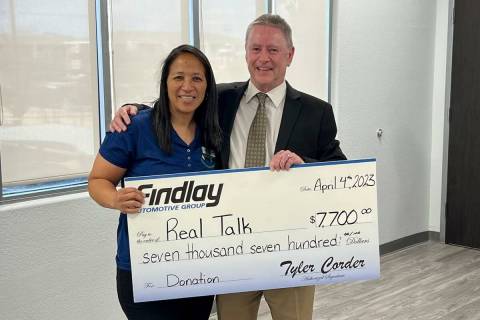 Sheree Corniel, the founder of Real Talk, poses with Tyler Corder, CFO of Findlay Automotive, w ...
