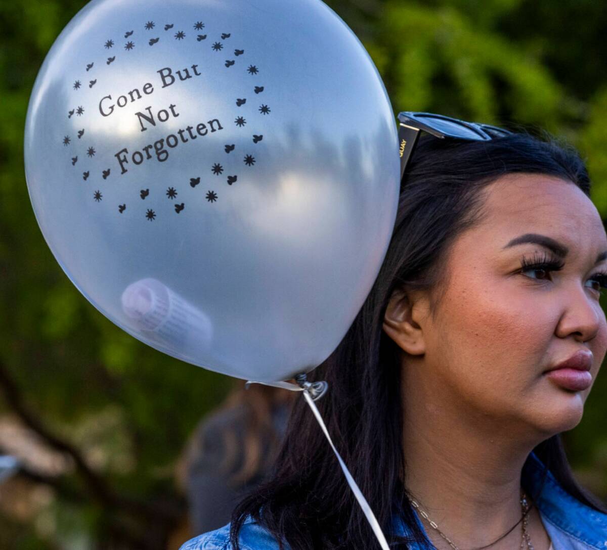 Poems written by Tabatha Tozzi, 26, are inserted into balloons which will be released in her ho ...