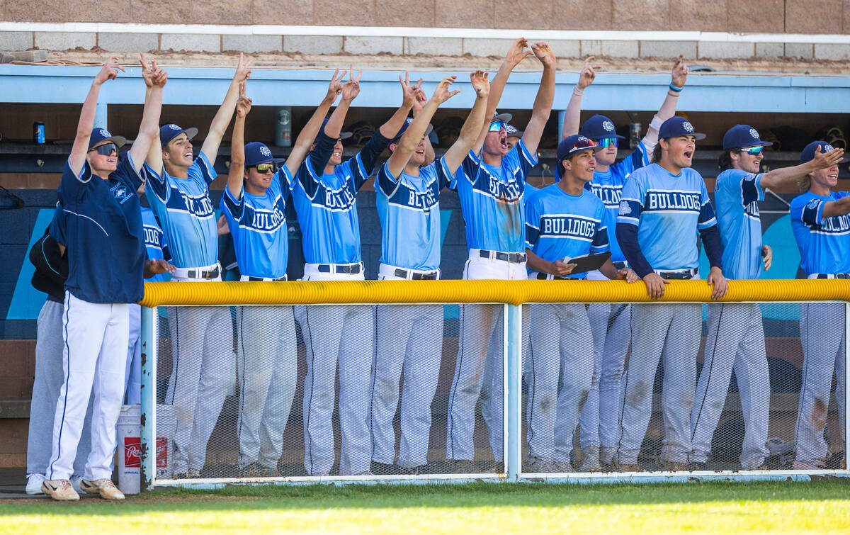 Centennial players celebrate another run against Bishop Gorman during the seventh inning of the ...