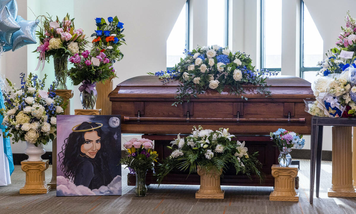 A painting by a friend adorns the front of her casket during a funeral service for Tabatha Tozz ...