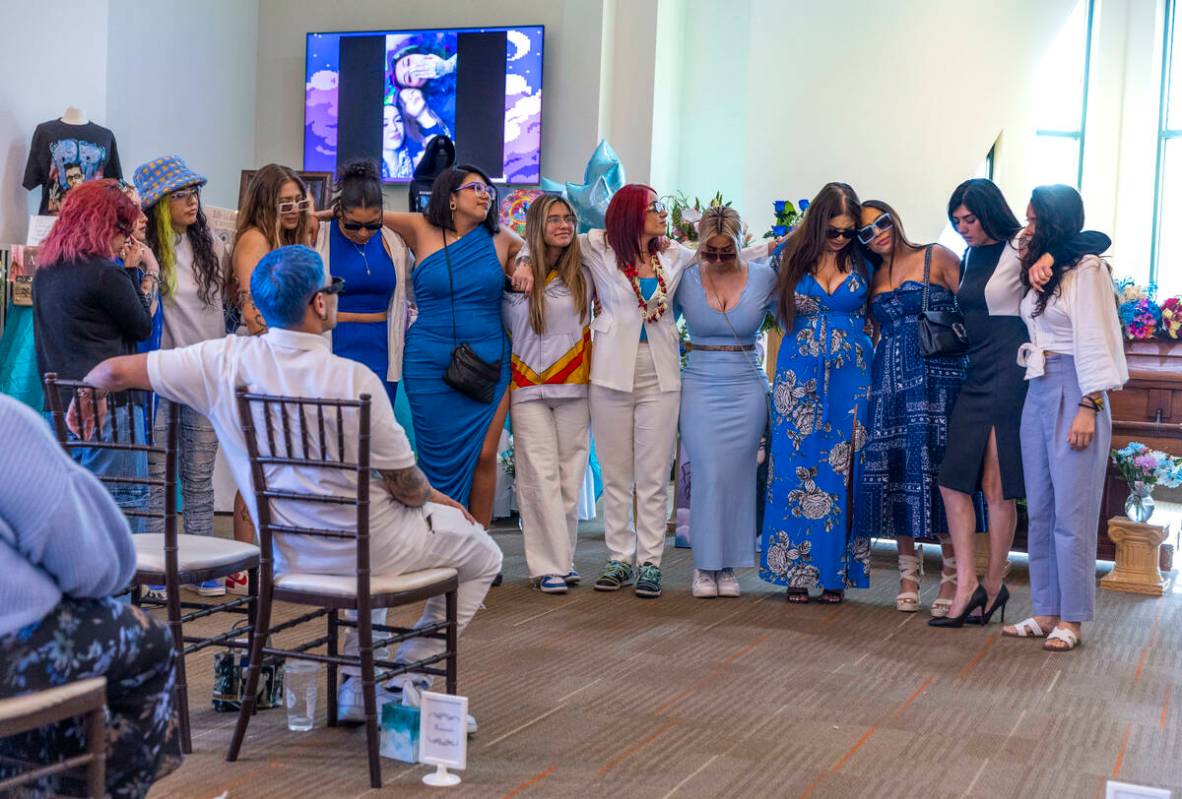 Friends and family members gather before her casket during a funeral for Tabatha Tozzi at Palms ...