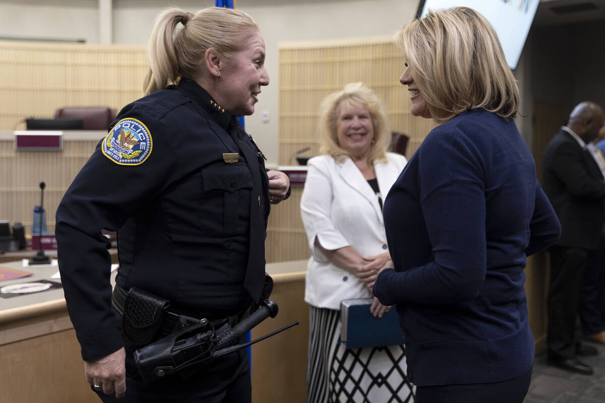 Police chief Hollie Chadwick greets Mayor Michelle Romero after her swearing-in ceremony at Hen ...