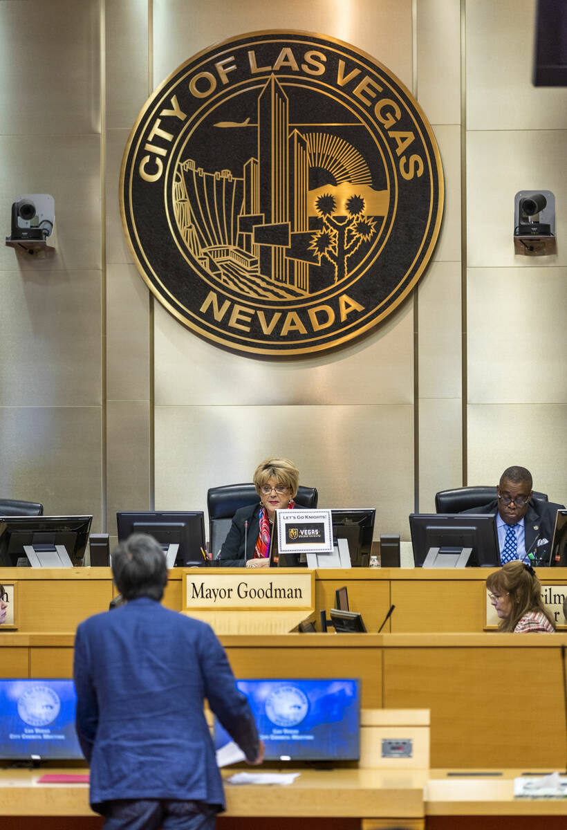Mayor Carolyn Goodman listens as Research Director Ken Liu with Valley Hospital workers announc ...