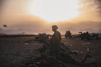 U.S. Army Soldiers assigned to the 10th Mountain Division stand security at Hamid Karzai Intern ...