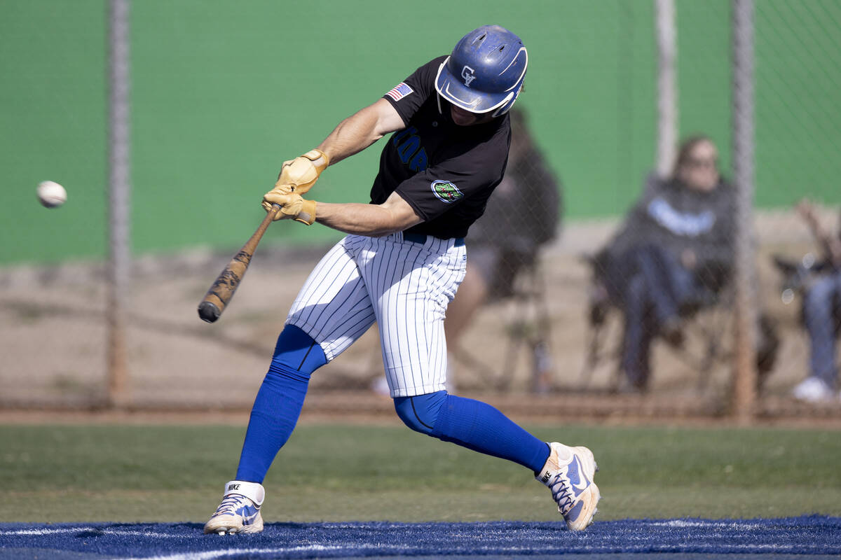 Green Valley’s Chaz McNelis bats against Centennial during a high school baseball game a ...