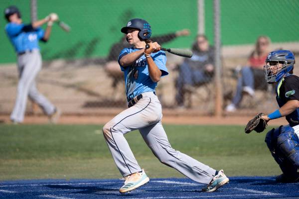 Centennial’s Carson Lee bats against Green Valley during a high school baseball game at ...