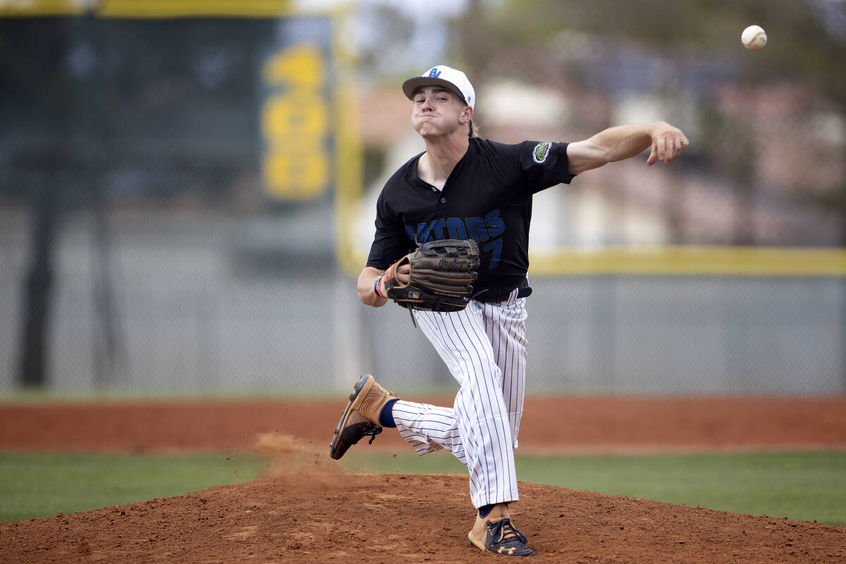 Green Valley’s Brady Ballinger pitches to Centennial during a high school baseball game ...