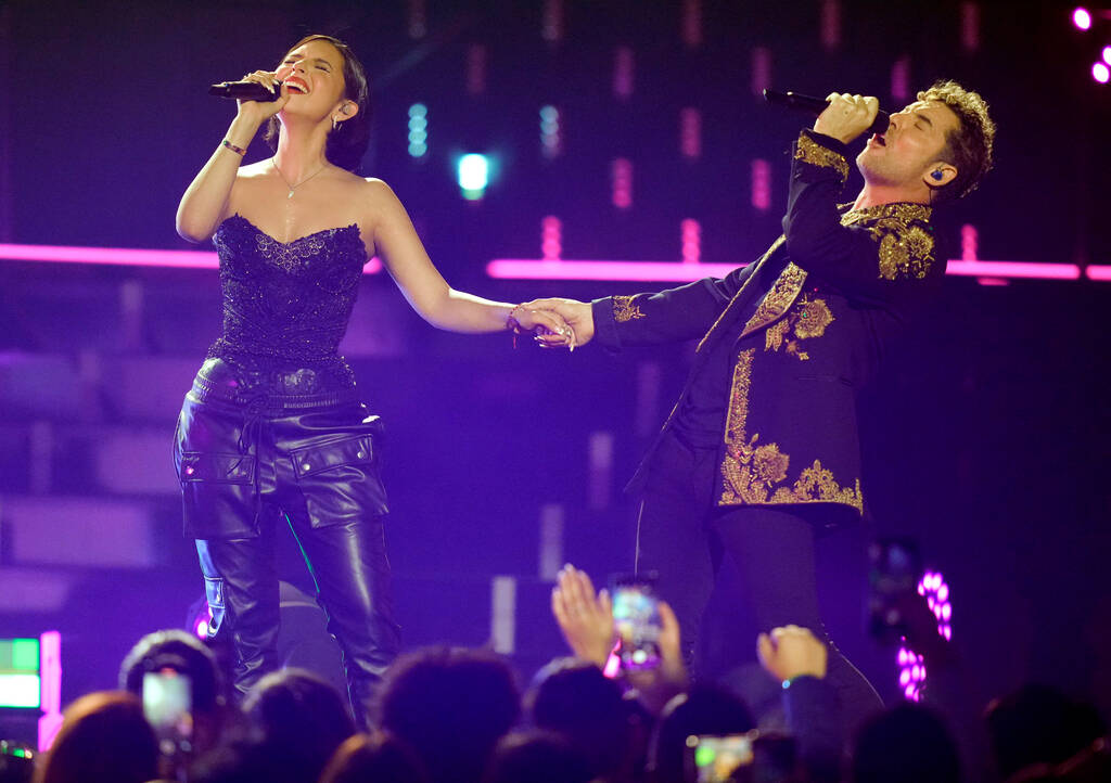 Angela Aguilar, left, and David Bisbal perform at the Latin American Music Awards on Thursday, ...