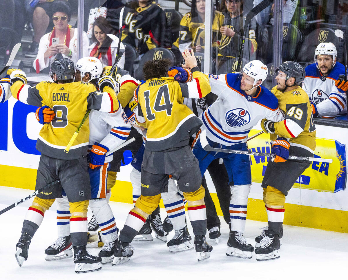 Golden Knights and Edmonton Oilers players fight again during the third period in Game 2 of an ...