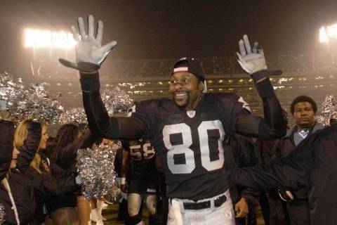 Oakland Raiders receiver Jerry Rice celebrates the team's 41-24 victory over the Tennessee Tita ...
