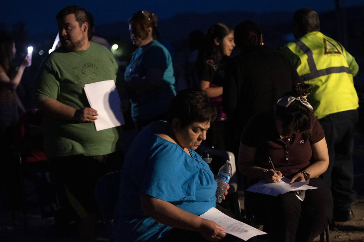 Lytle Ranch neighbors gather at the Anchondo’s home to discuss solutions and sign petiti ...