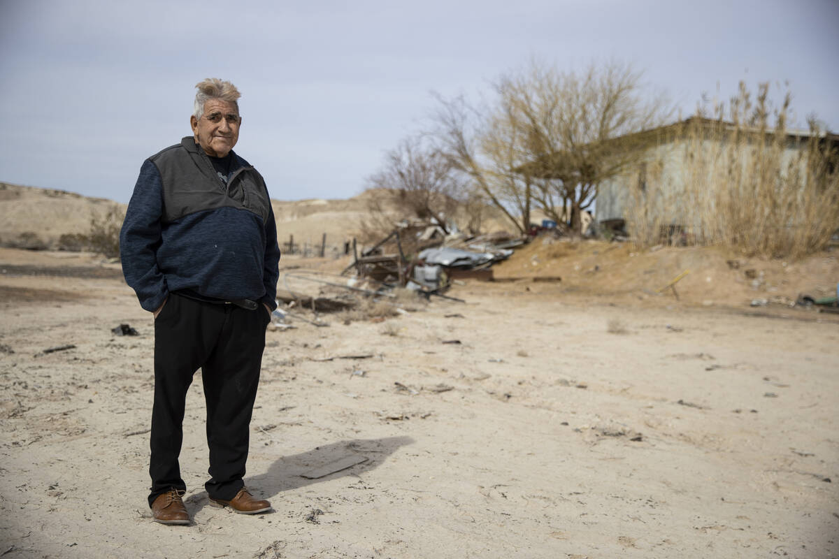 Oscar Anchondo stands outside of his home in the Lytle Ranch neighborhood in Moapa, Nev., Frida ...