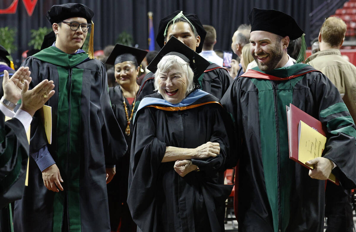 James Clark, right, leaves with his mother Alice Shillock-Clark after the commencement and acad ...