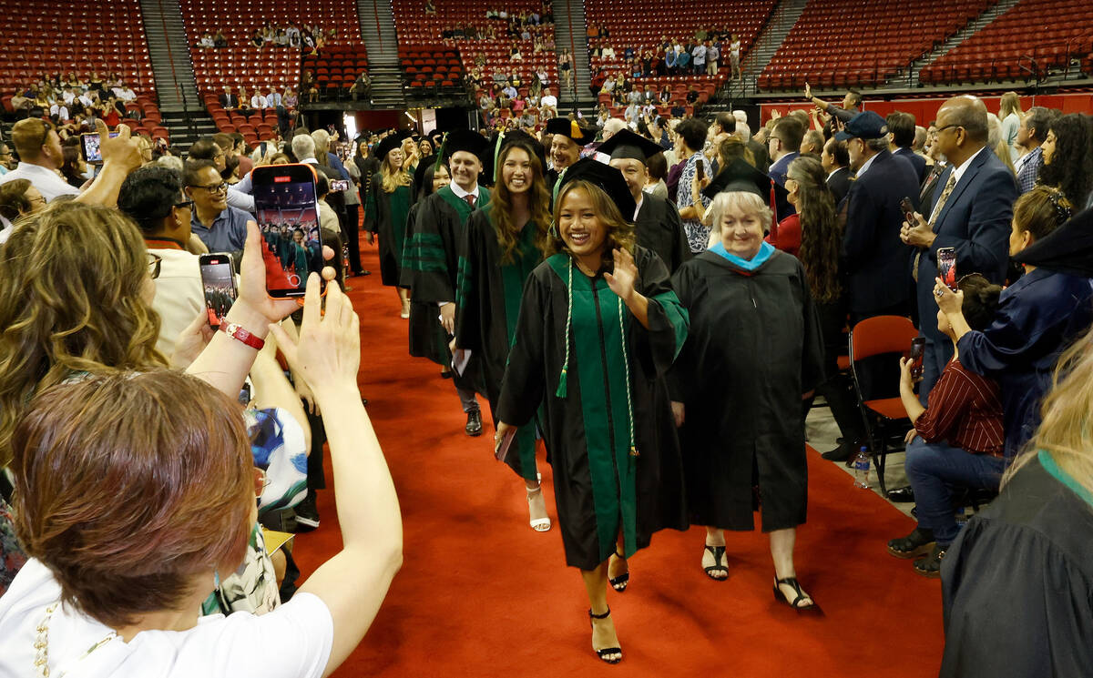 Students proceed to their seats during the commencement and academic hooding ceremony of Kirk K ...