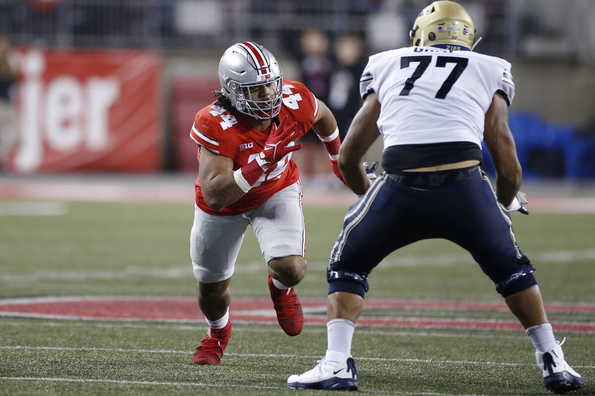 Ohio State defensive lineman J.T. Tuimoloau plays against Akron during an NCAA college football ...