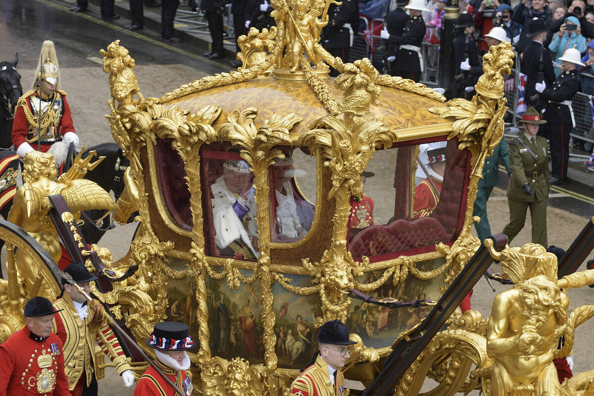 Britain's King Charles III and Camilla, Queen Consort travel in the Gold State Coach from Westm ...