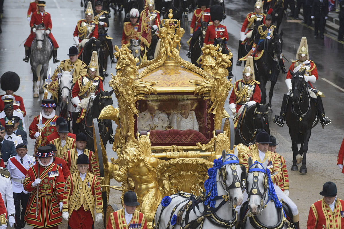 Britain's King Charles III and Camilla, Queen Consort travel in the Gold State Coach from Westm ...