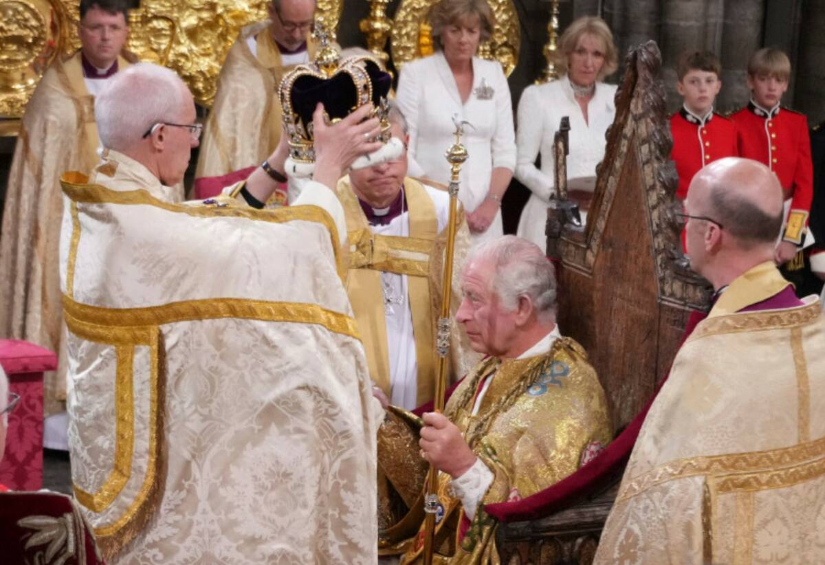 King Charles III is crowned with the St Edward's Crown by The Archbishop of Canterbury Justin W ...