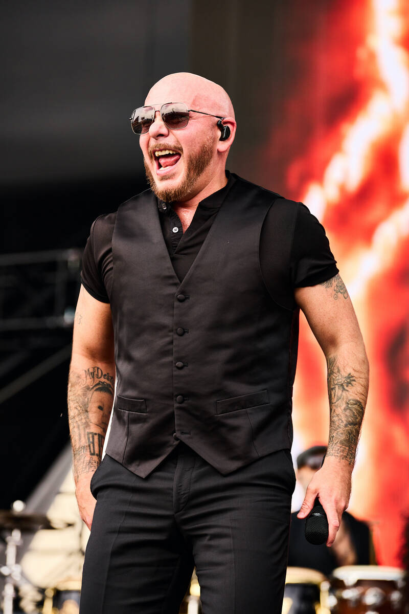 Pitbull is shown at the Lovers & Friends music festival at the Las Vegas Festival Grounds on Sa ...