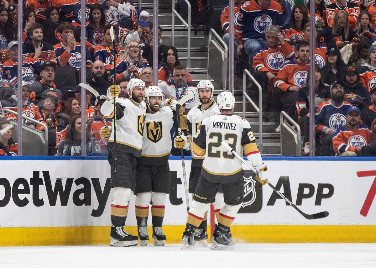 Vegas Golden Knights celebrate after a goal against the Edmonton Oilers during second-period NH ...