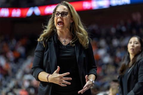 Las Vegas Aces head coach Becky Hammon shouts at her team from the sidelines during the second ...