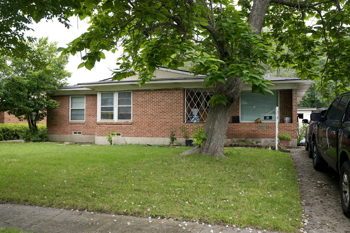 The front entrance of a home connected to suspected mall gunman, Mauricio Garcia, is seen, Sund ...
