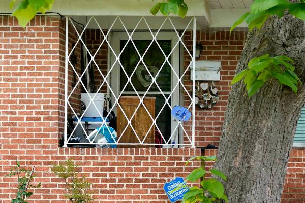 The front entrance of a home connected to suspected mall gunman, Mauricio Garcia, is seen, Sund ...
