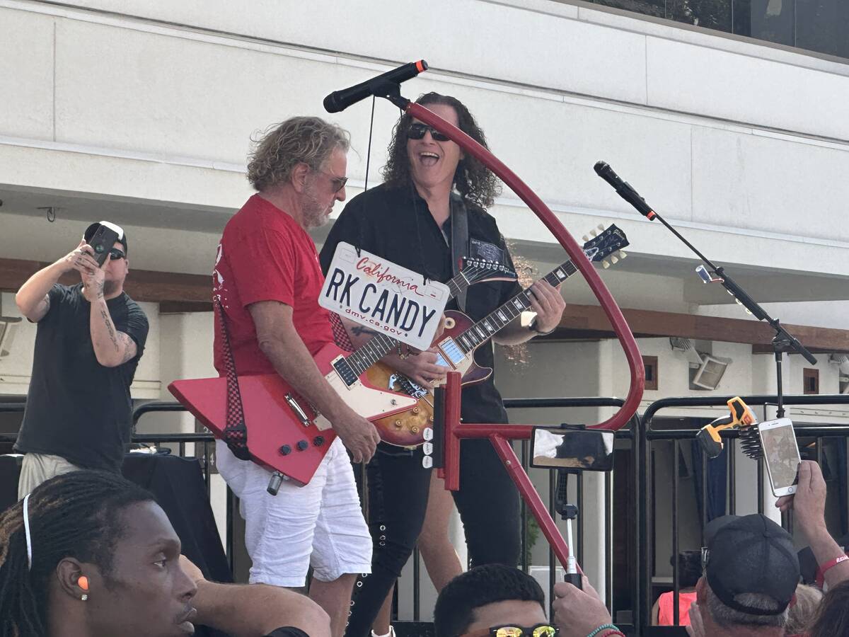 Sammy Hagar is shown with guitarist Steve Heath at SOAK Pool at the Palms during a pop-up show ...